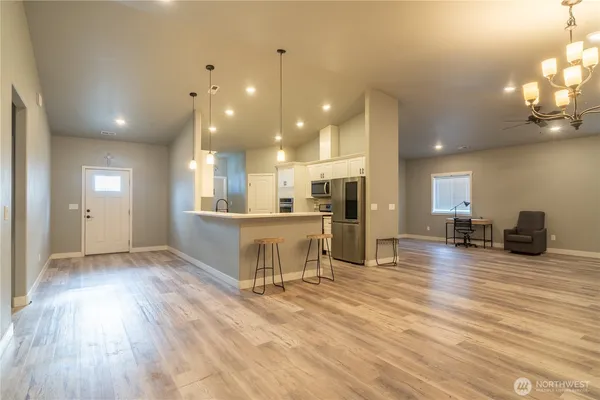 a view of a kitchen and dining room