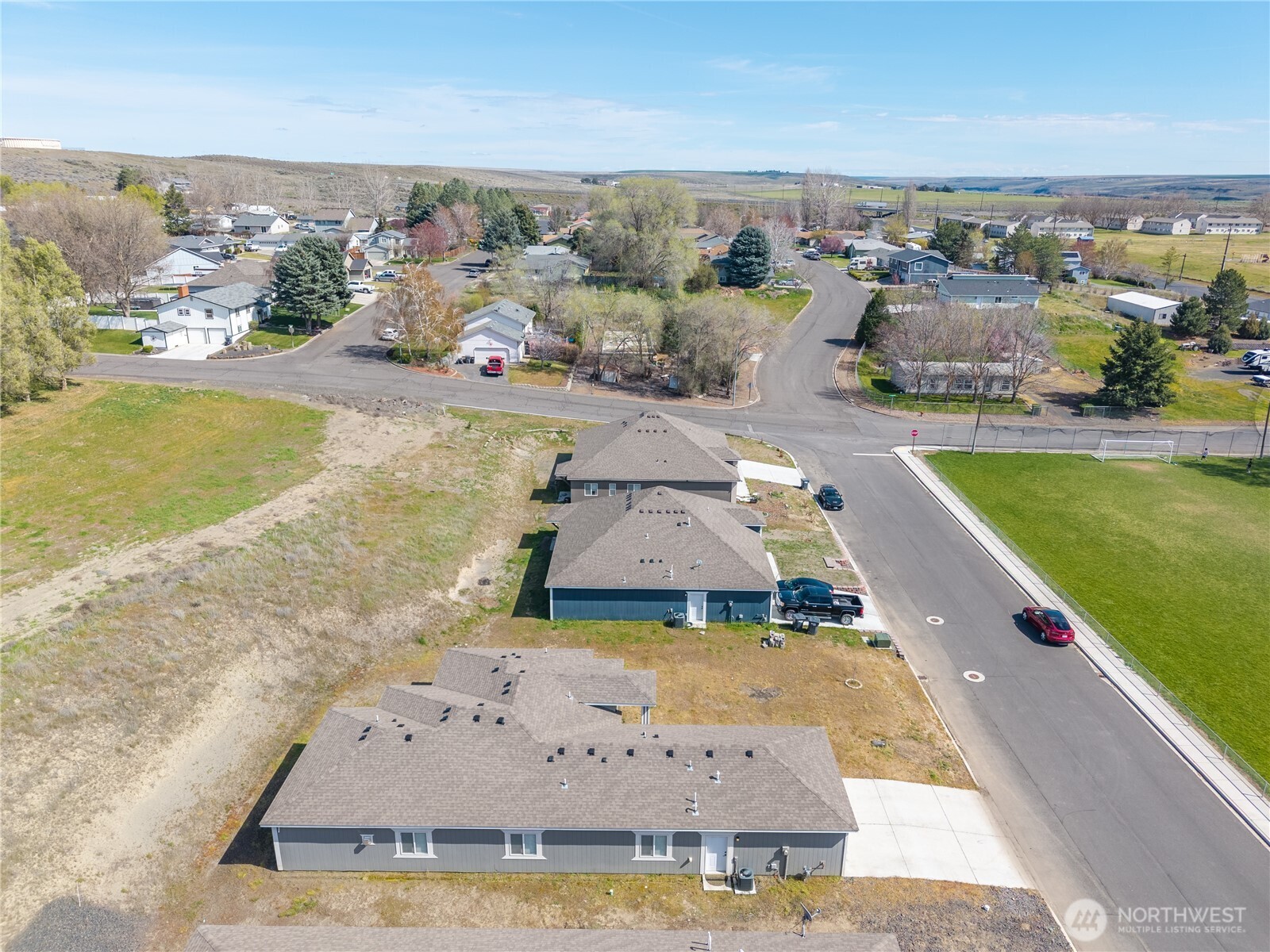 352 East Davis Street Connell, WA 99326 - Photo 10 of 40 an aerial view of a house with a swimming pool