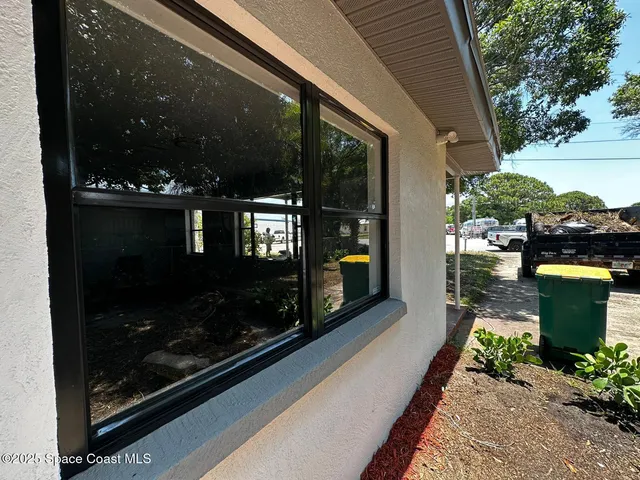 a view of a street with sitting area