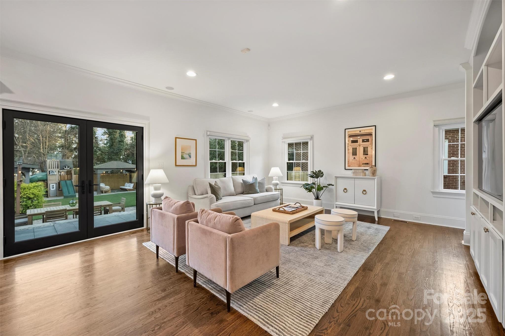 1914 Club Road Charlotte, NC 28205 - Photo 14 of 40 a living room with furniture and large window with wooden floor