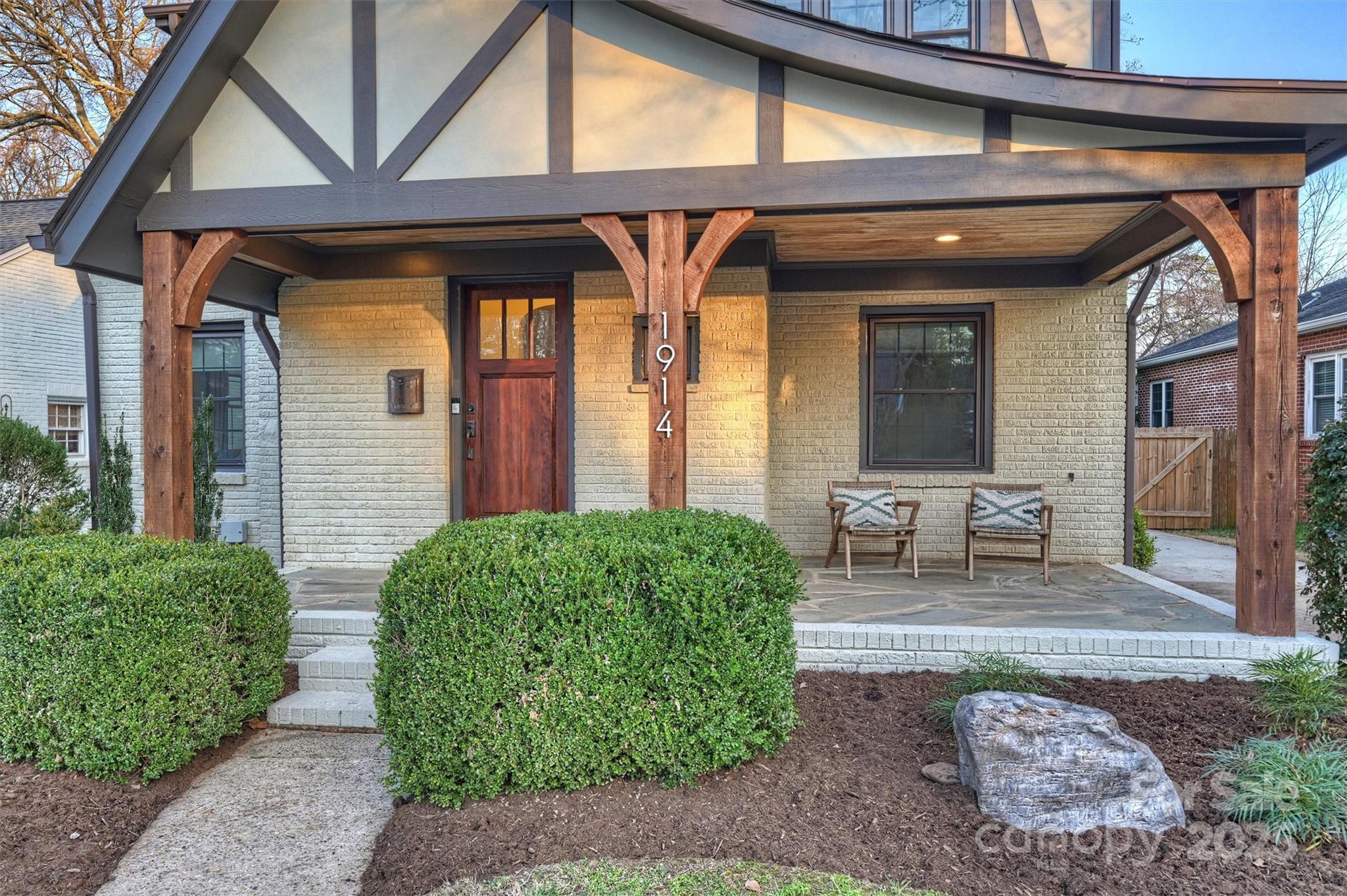 1914 Club Road Charlotte, NC 28205 - Photo 2 of 40 a front view of a house with garden