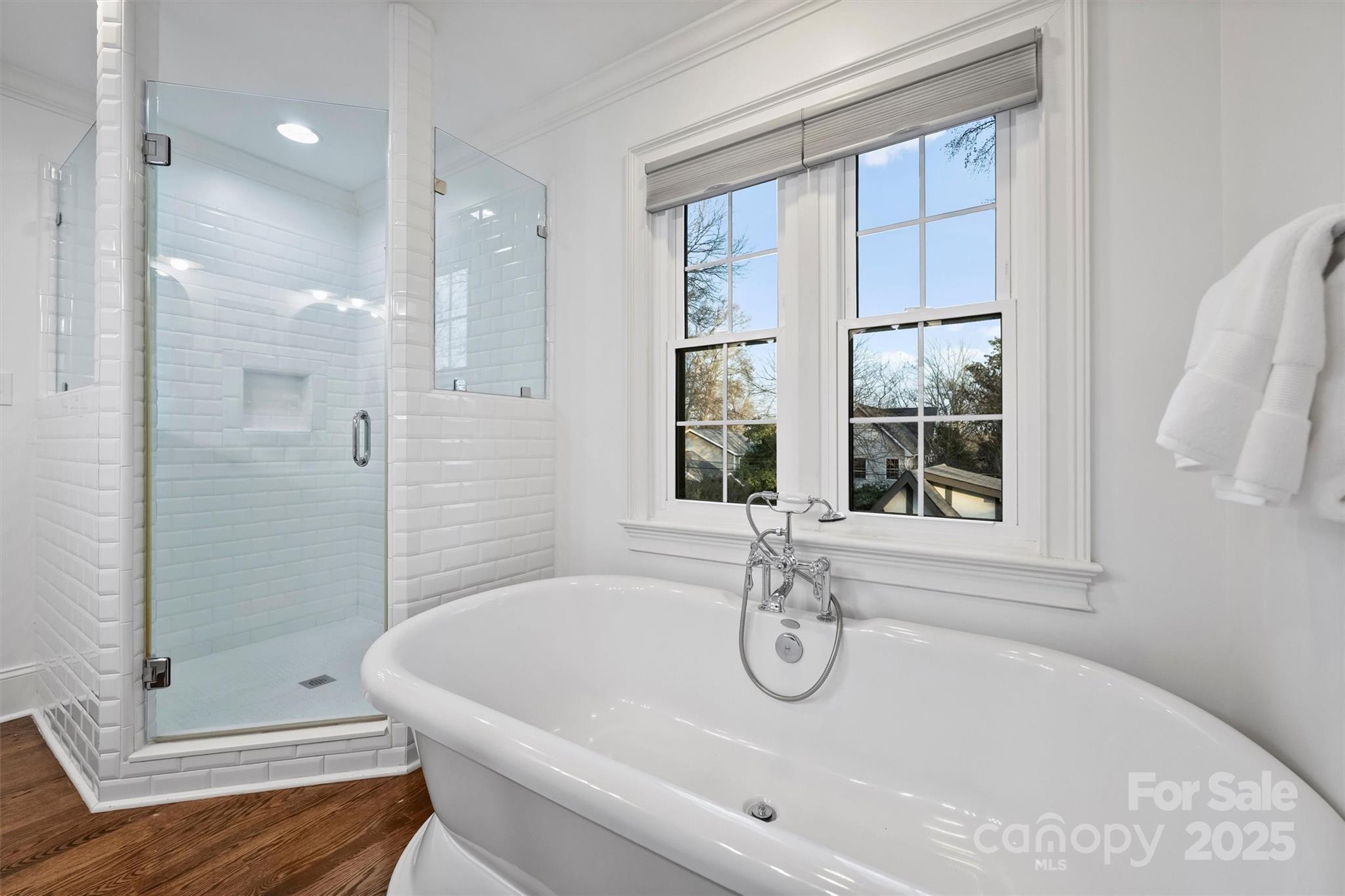 1914 Club Road Charlotte, NC 28205 - Photo 22 of 40 a bathroom with a tub sink and shower