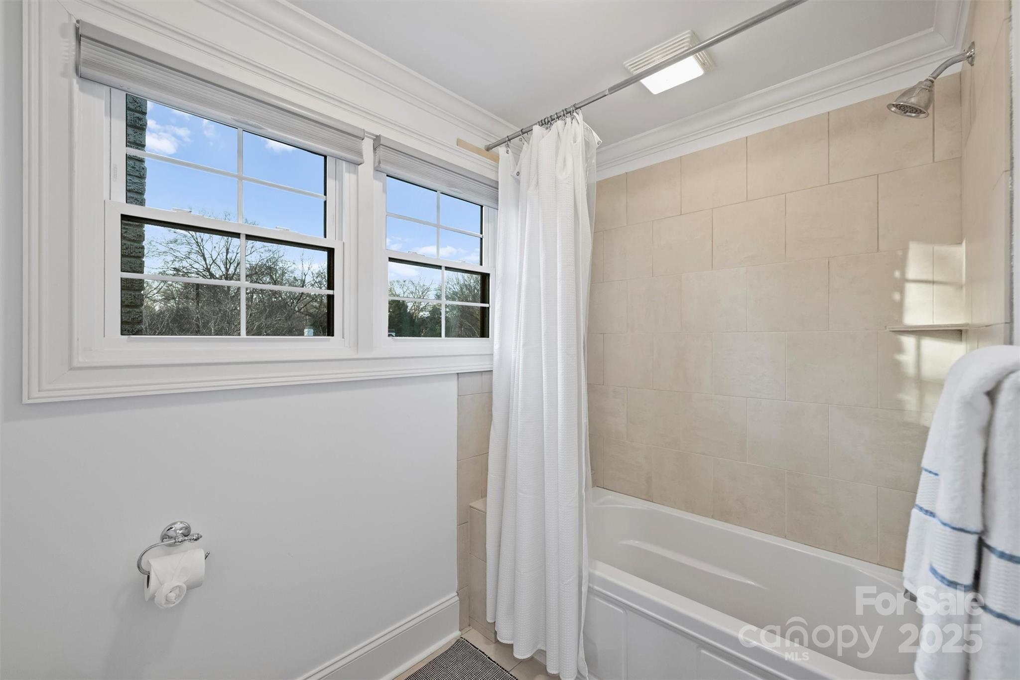 1914 Club Road Charlotte, NC 28205 - Photo 28 of 40 a bathroom with a bathtub and shower