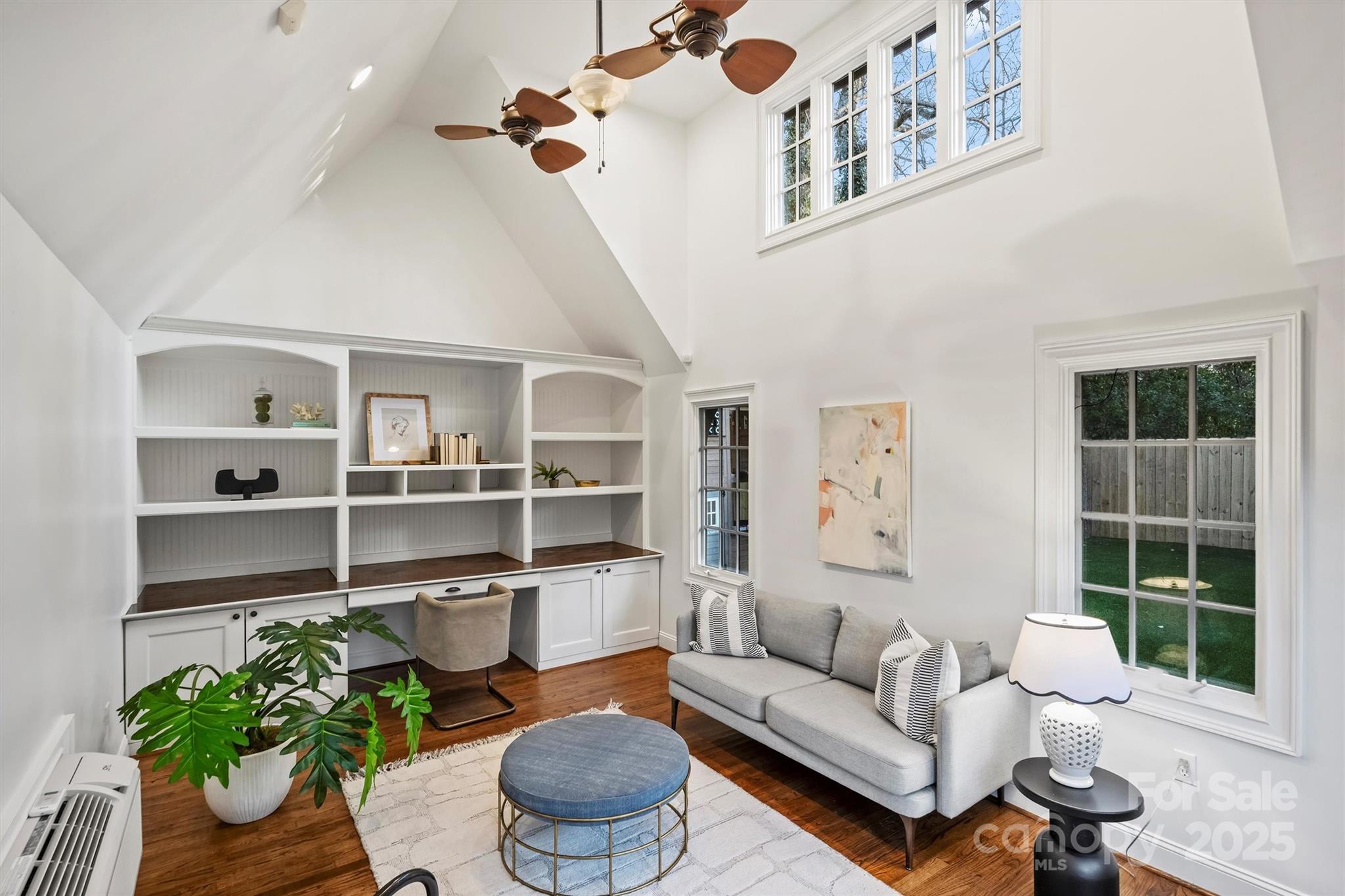 1914 Club Road Charlotte, NC 28205 - Photo 31 of 40 a living room with furniture potted plant and a window