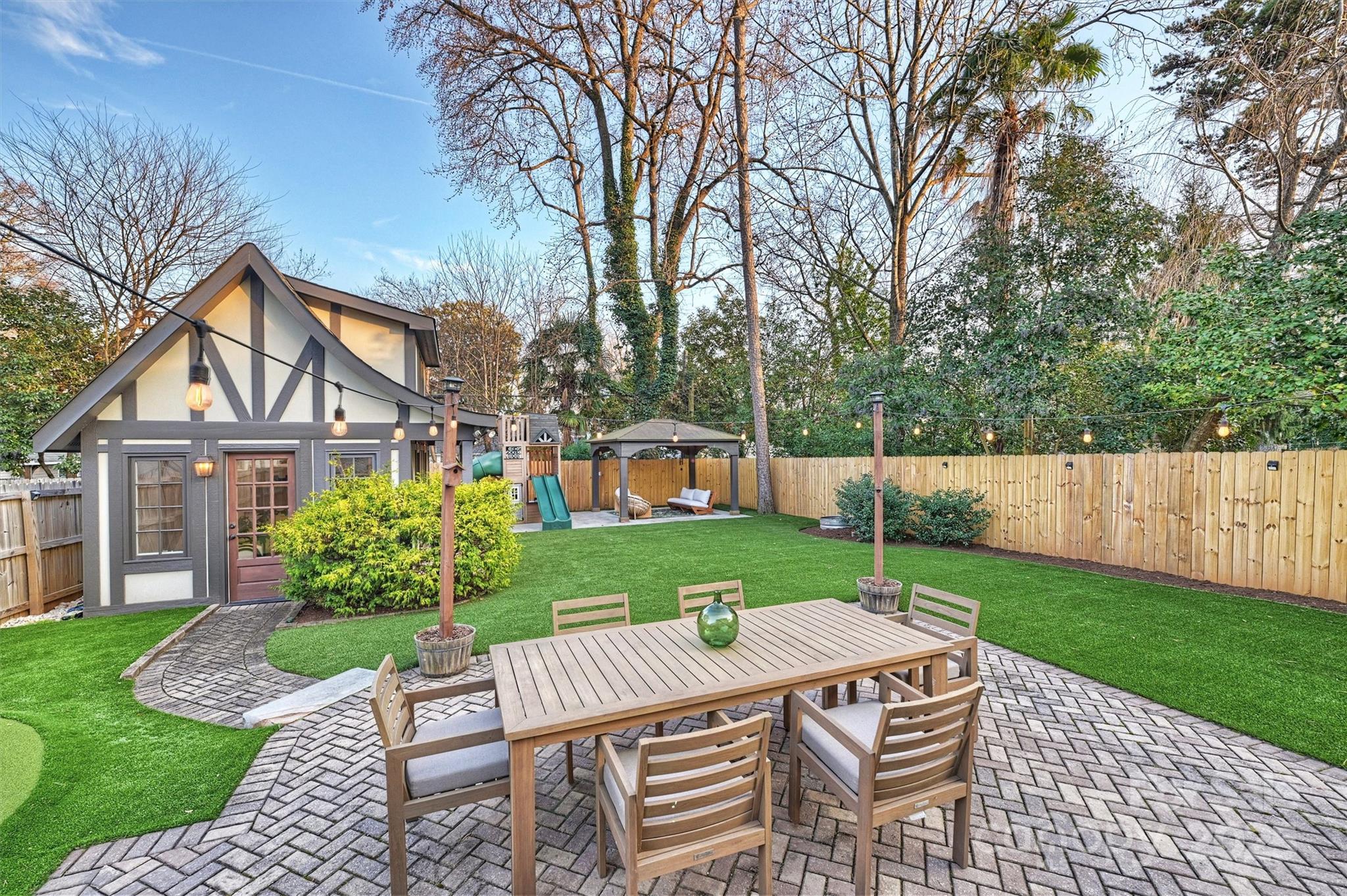 1914 Club Road Charlotte, NC 28205 - Photo 33 of 40 a view of a house with backyard and sitting area