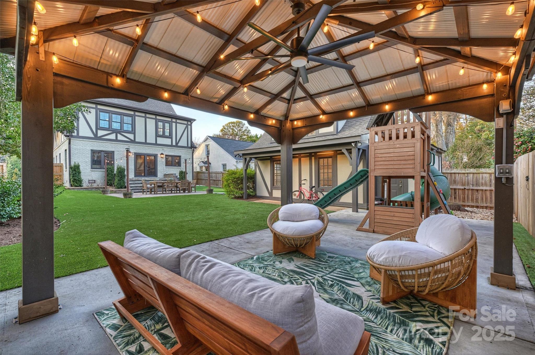 1914 Club Road Charlotte, NC 28205 - Photo 37 of 40 a view of an house with backyard and furniture