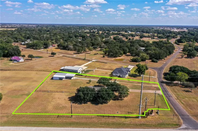 a view of a balcony with chairs