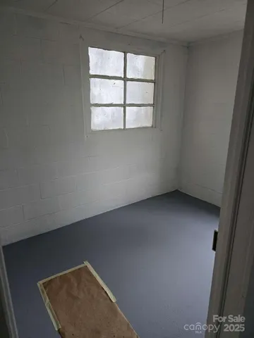 an empty room with windows