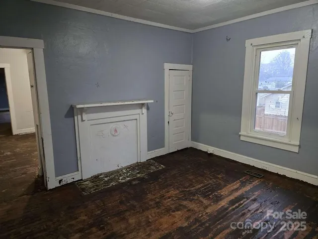 an empty room with windows