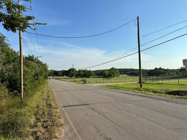 a view of a house with a big yard