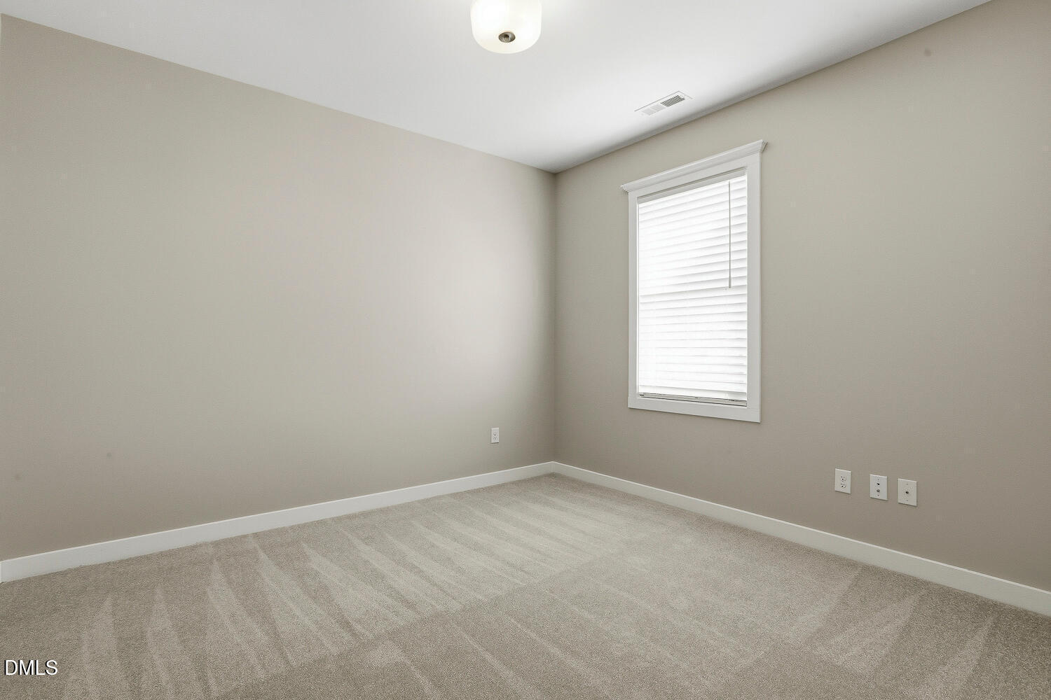 1605 Boyer Street Raleigh, NC 27610 - Photo 27 of 38 an empty room with a window