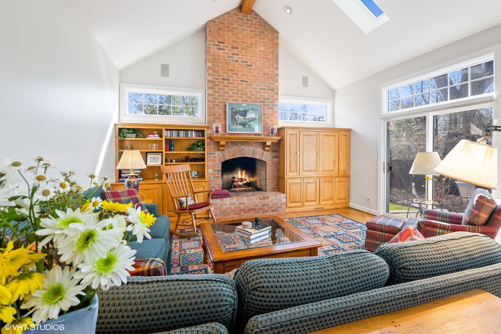 914 Cherokee Road Wilmette, IL 60091 - Photo 12 of 24 a living room with furniture and a fireplace