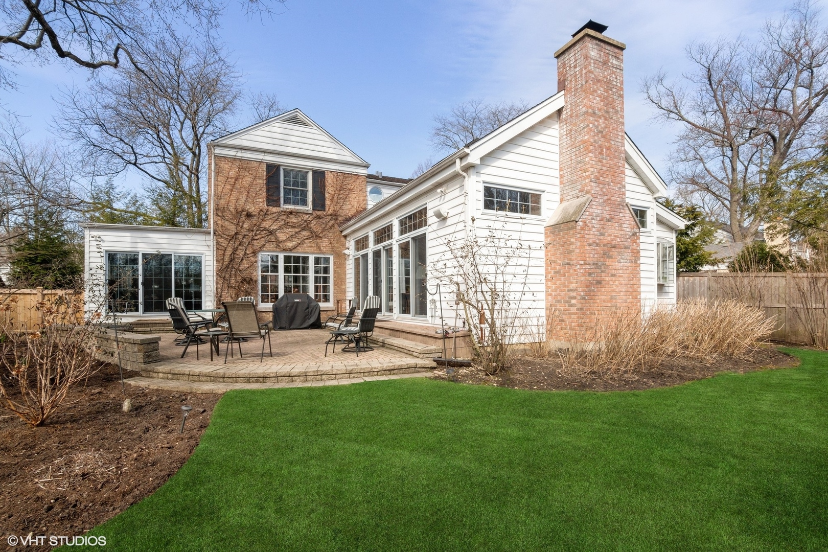 914 Cherokee Road Wilmette, IL 60091 - Photo 19 of 24 a front view of house with yard and seating area