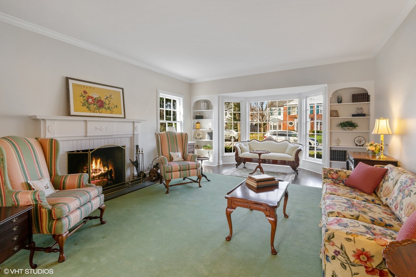 914 Cherokee Road Wilmette, IL 60091 - Photo 5 of 24 a living room with furniture and a fireplace