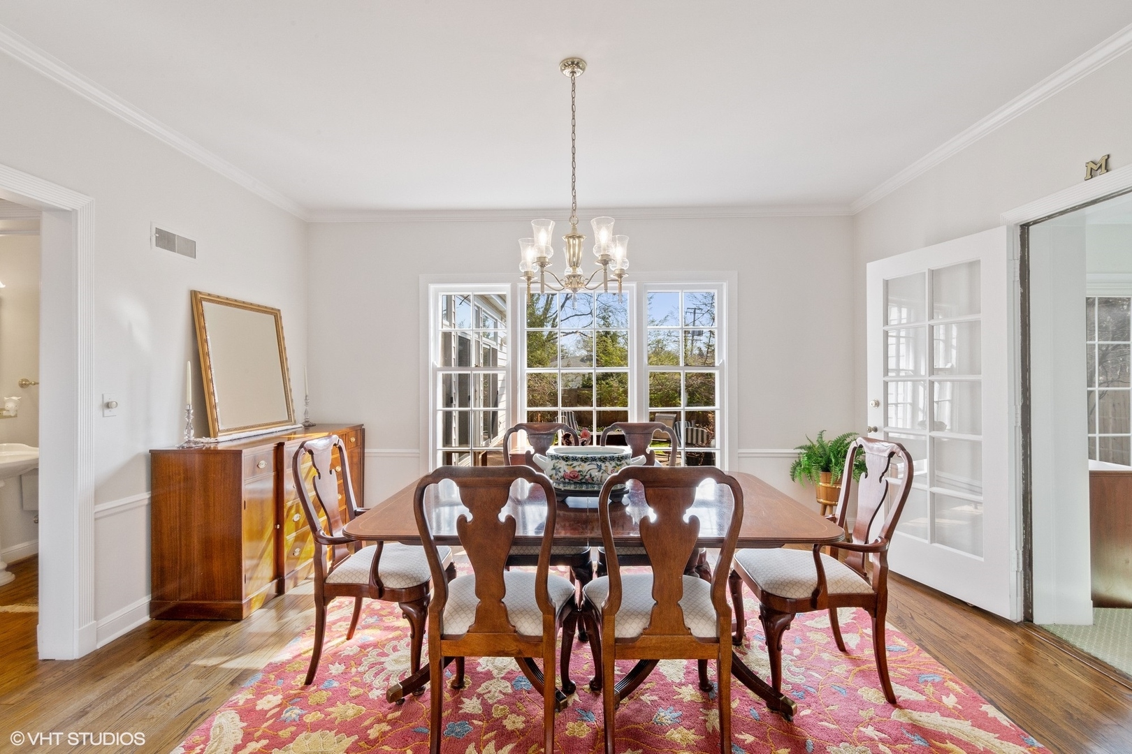 914 Cherokee Road Wilmette, IL 60091 - Photo 7 of 24 a view of a dining room with furniture window and wooden floor