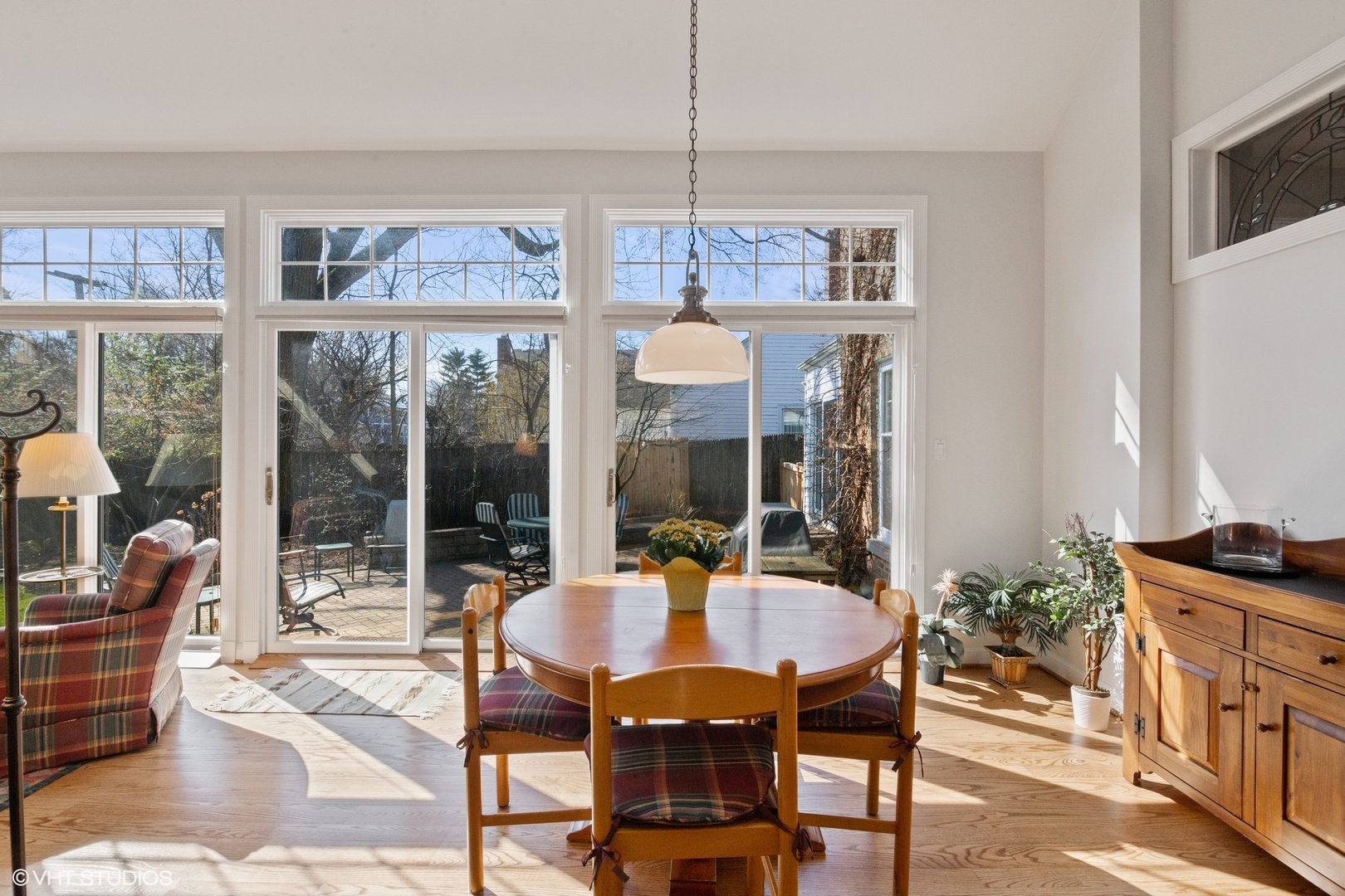 914 Cherokee Road Wilmette, IL 60091 - Photo 10 of 24 a view of a dining room with furniture wooden floor and a chandelier