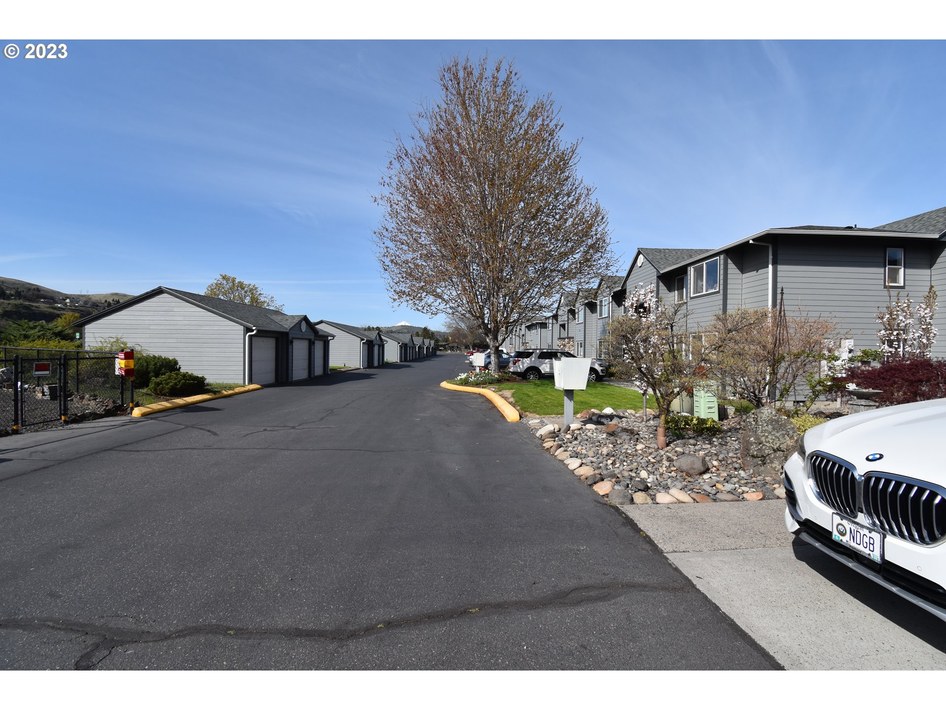Pine Street The Dalles, OR 97058 - Photo 10 of 12 a view of a house with a yard