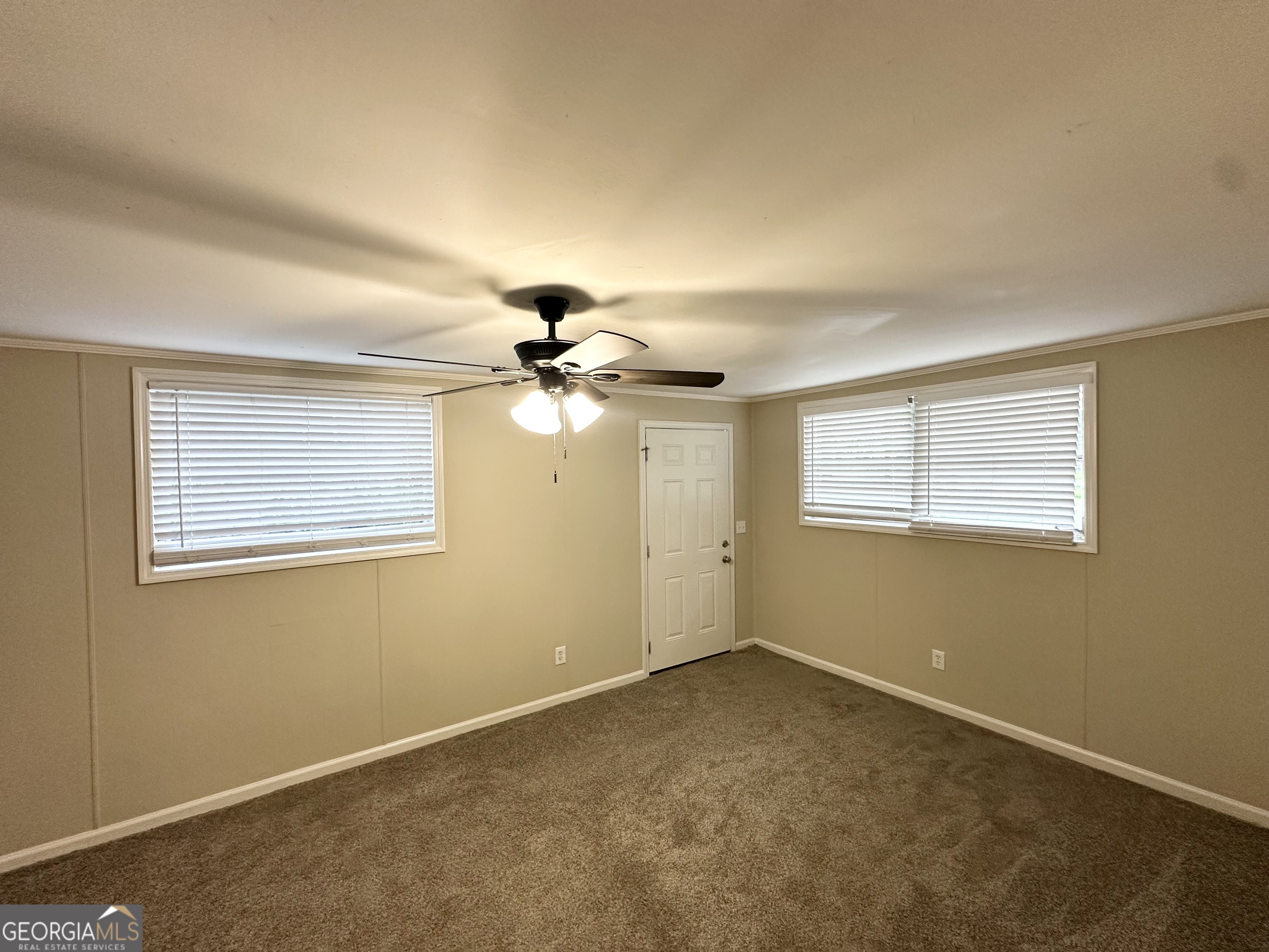 4385 Midway Road Douglasville, GA 30134 - Photo 11 of 12 a view of an empty room with a window
