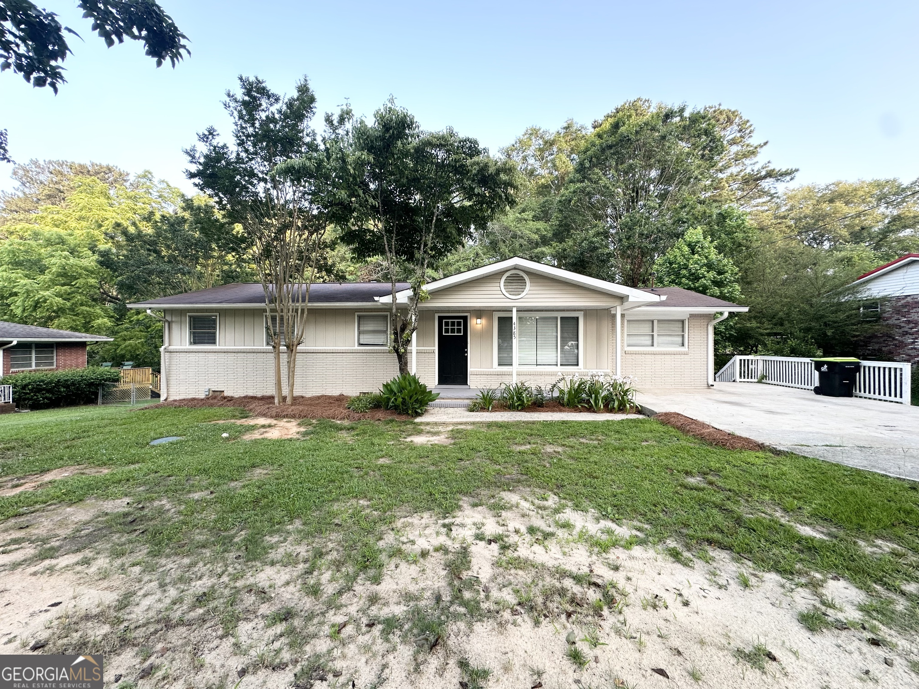 4385 Midway Road Douglasville, GA 30134 - Photo 2 of 12 a front view of house with yard and green space
