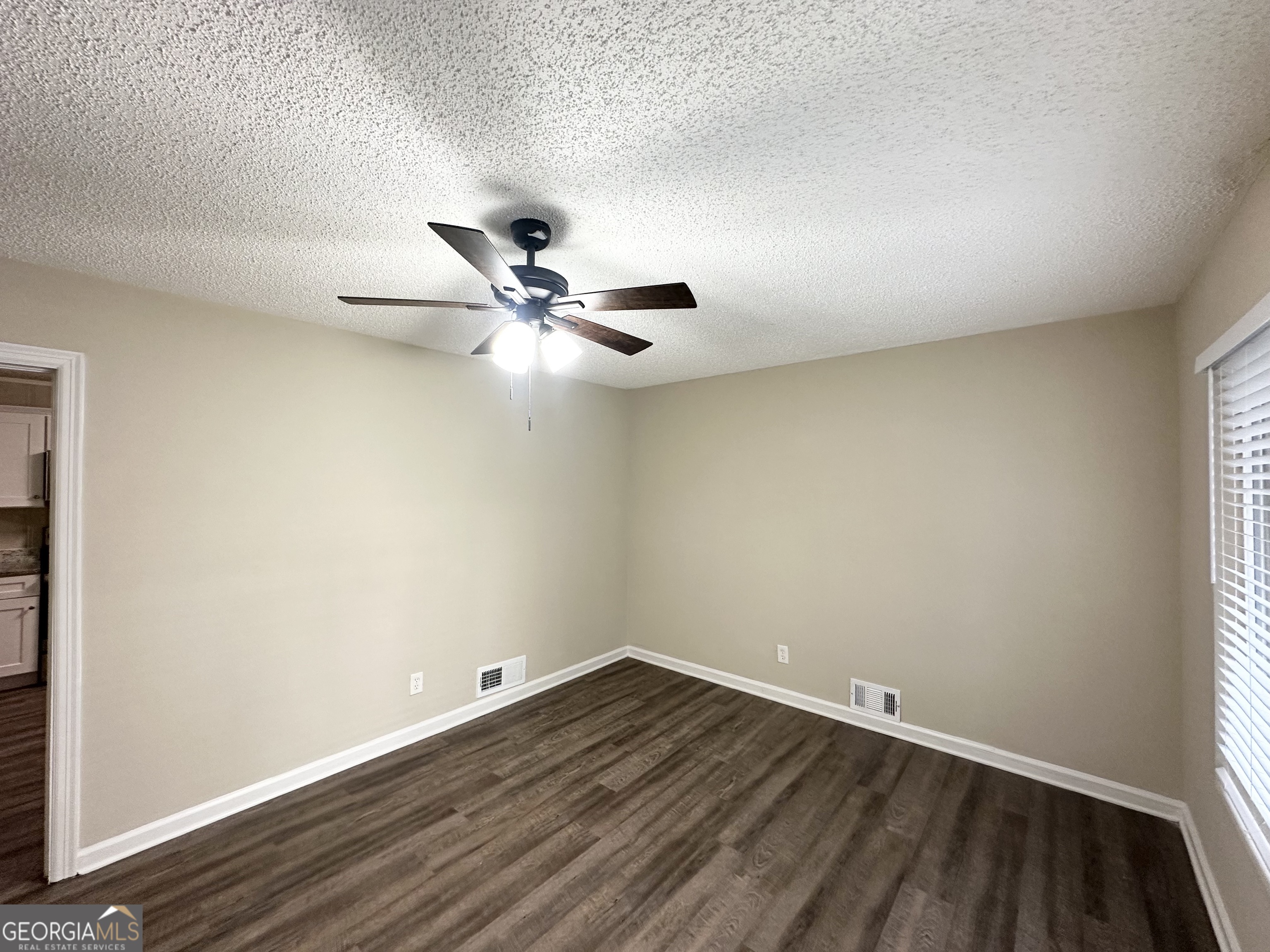 4385 Midway Road Douglasville, GA 30134 - Photo 3 of 12 wooden floor in an empty room