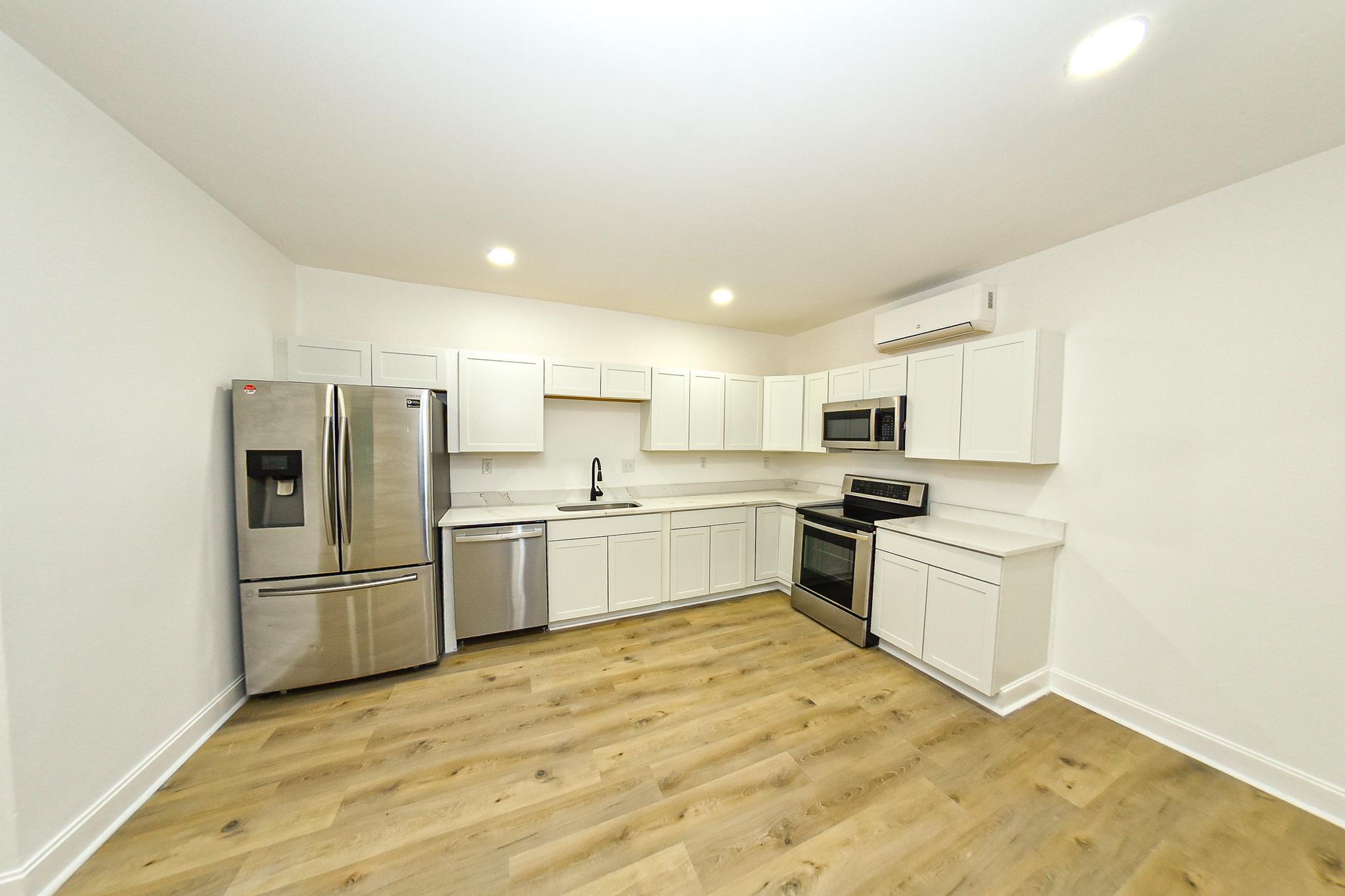 3704 Suitland Road Southeast Washington, DC 20020 - Photo 61 of 68 Modern in-law kitchen with sleek finishes.