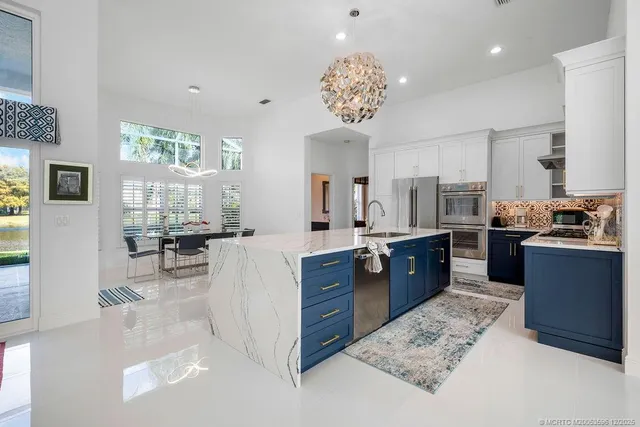 a view of a livingroom with furniture window and wooden floor