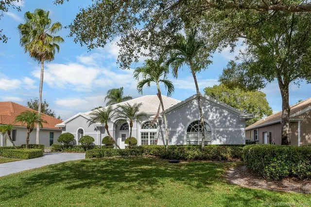 a view of a livingroom with furniture and windows