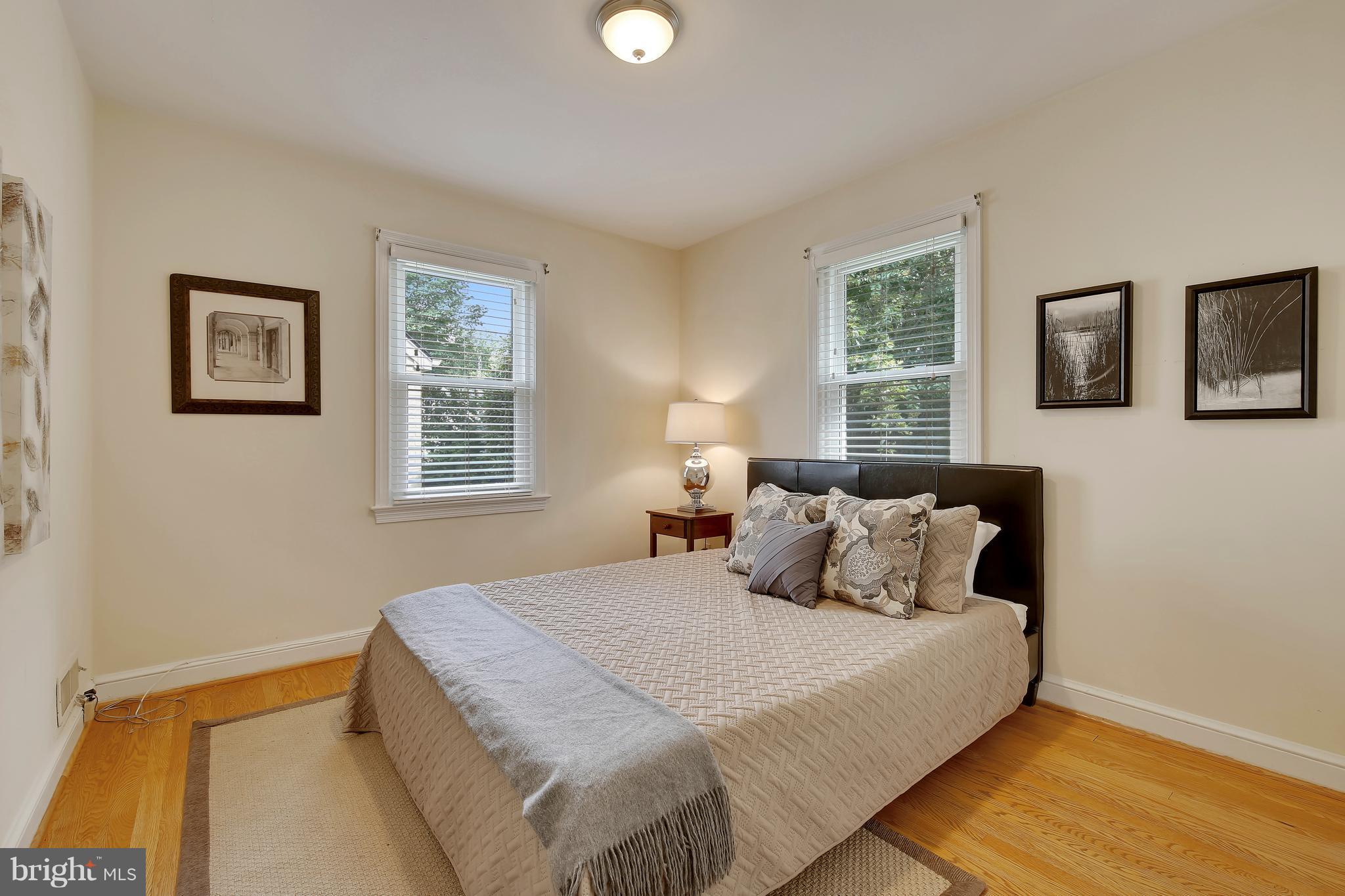 10209 Carson Place Silver Spring, MD 20901 - Photo 13 of 27 a bedroom with a bed and a window