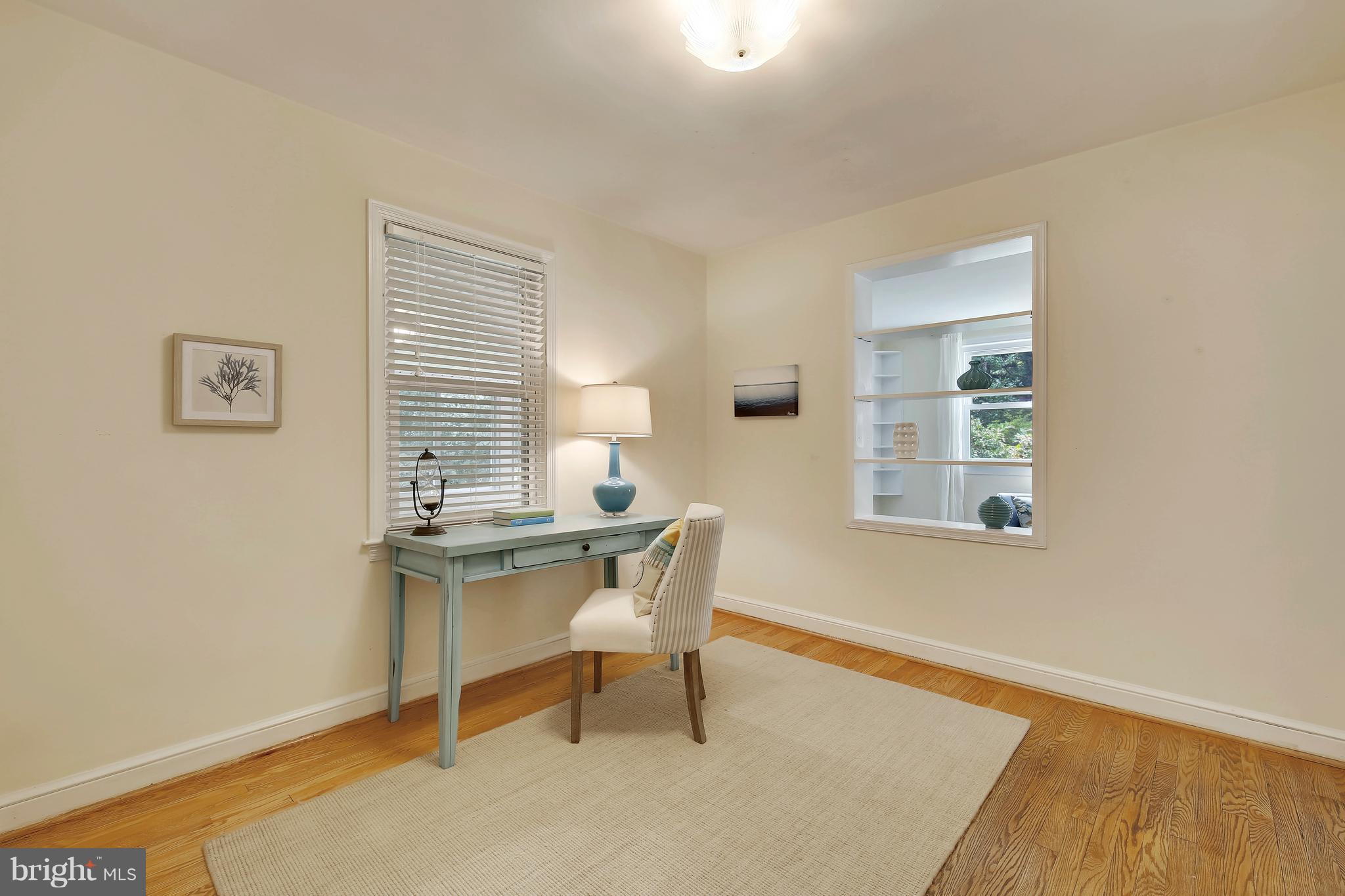 10209 Carson Place Silver Spring, MD 20901 - Photo 14 of 27 a workspace with furniture and a window