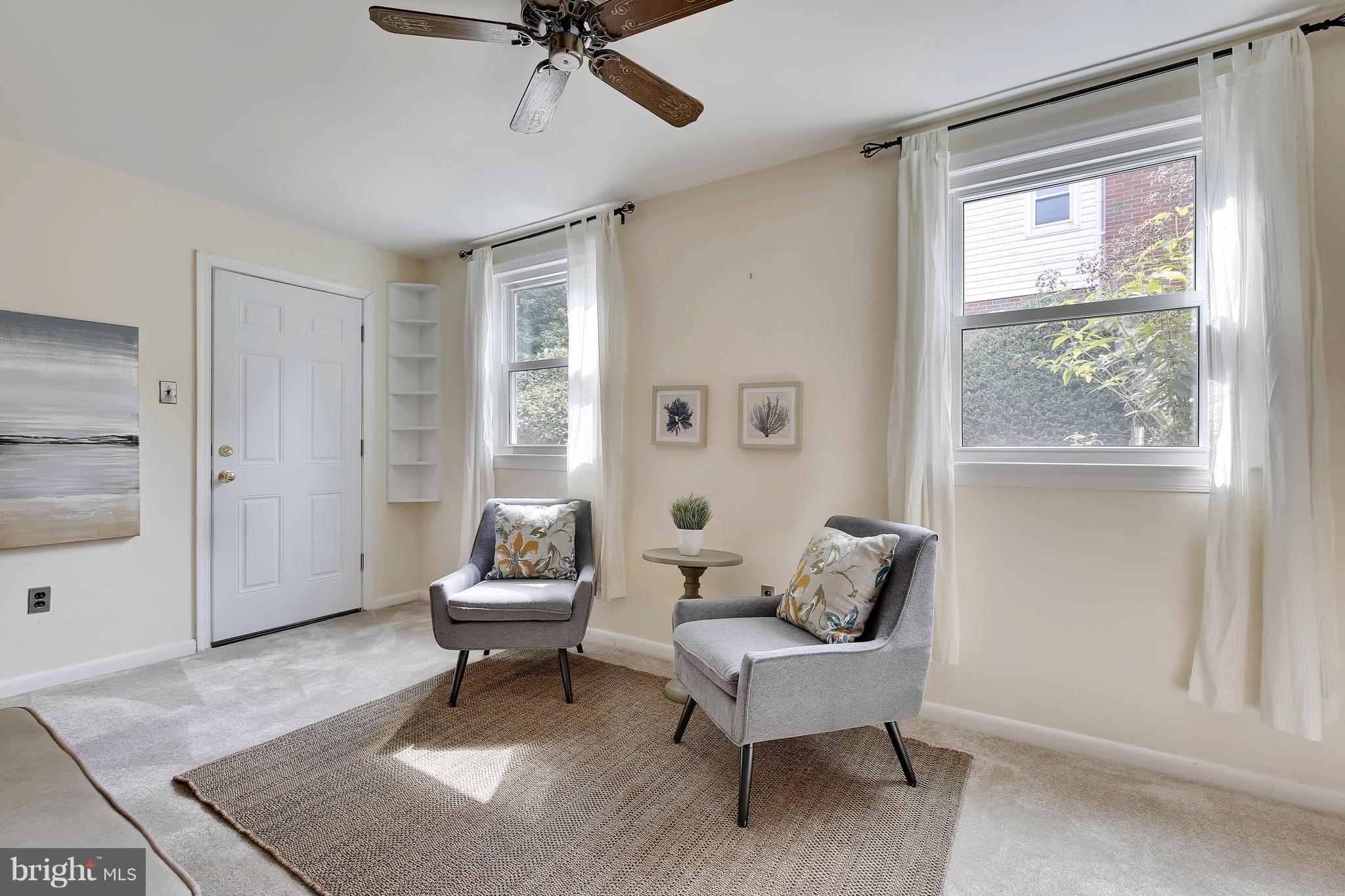 10209 Carson Place Silver Spring, MD 20901 - Photo 10 of 27 a living room with furniture and a window