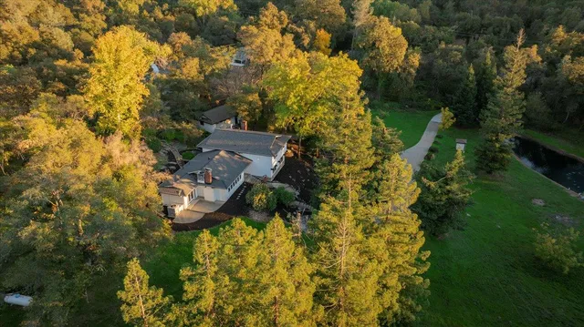a view of a house with a big yard