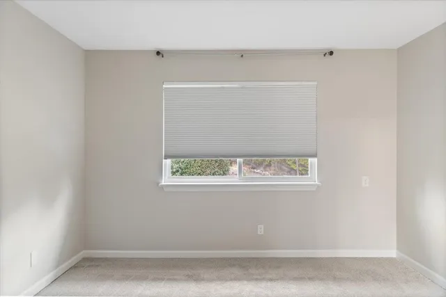 a view of a lake with a yard