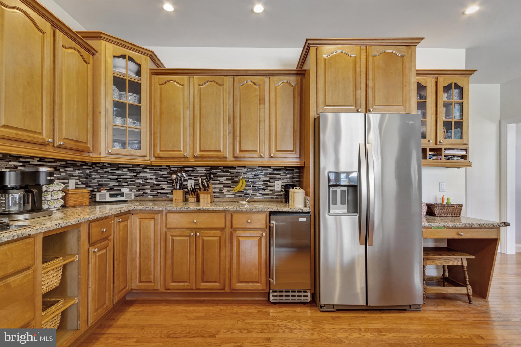 16132 Hudson Road Milton, DE 19968 - Photo 27 of 108 a kitchen with stainless steel appliances granite countertop a refrigerator and a sink