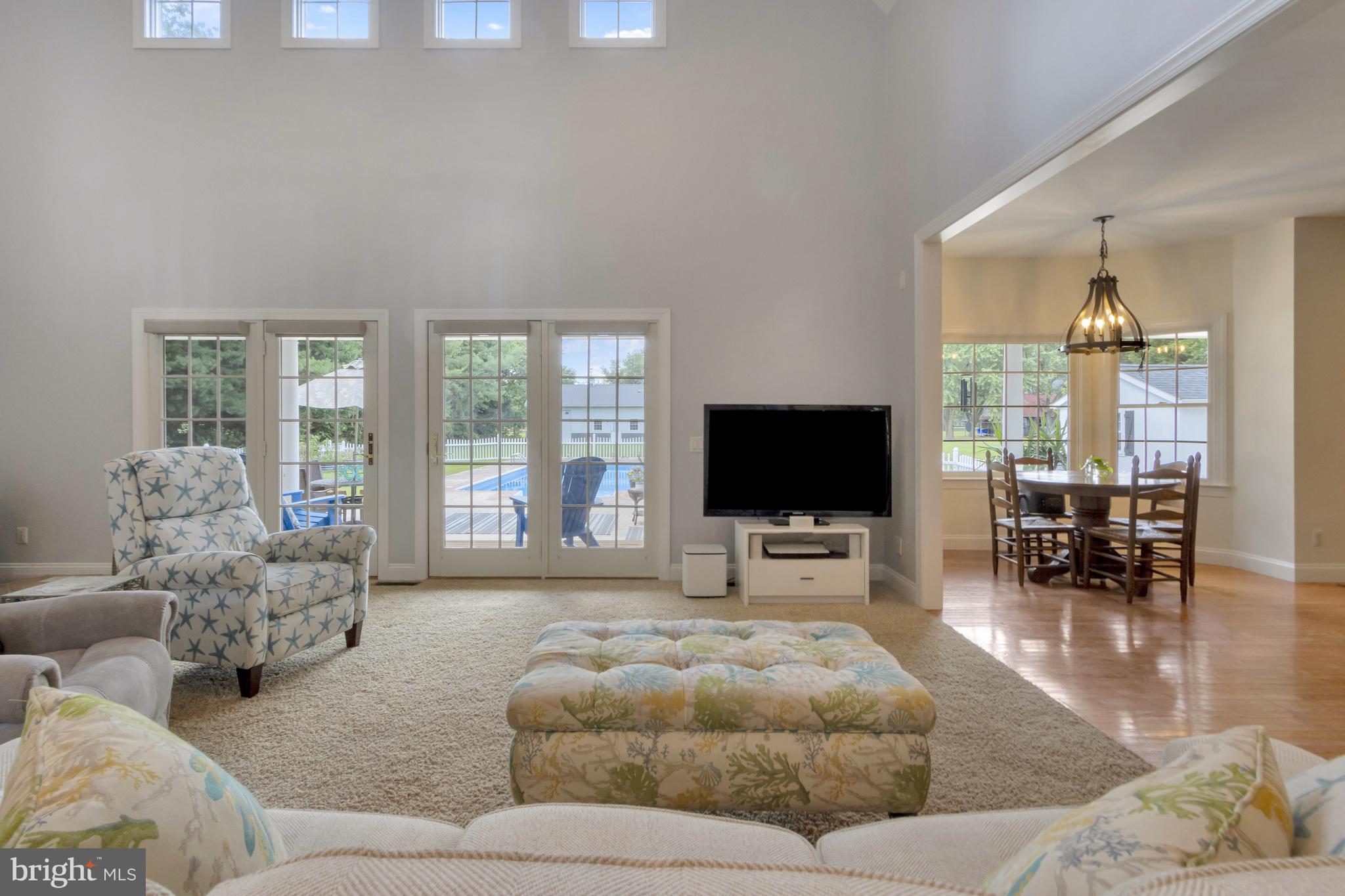 16132 Hudson Road Milton, DE 19968 - Photo 35 of 108 a living room with furniture and a flat screen tv