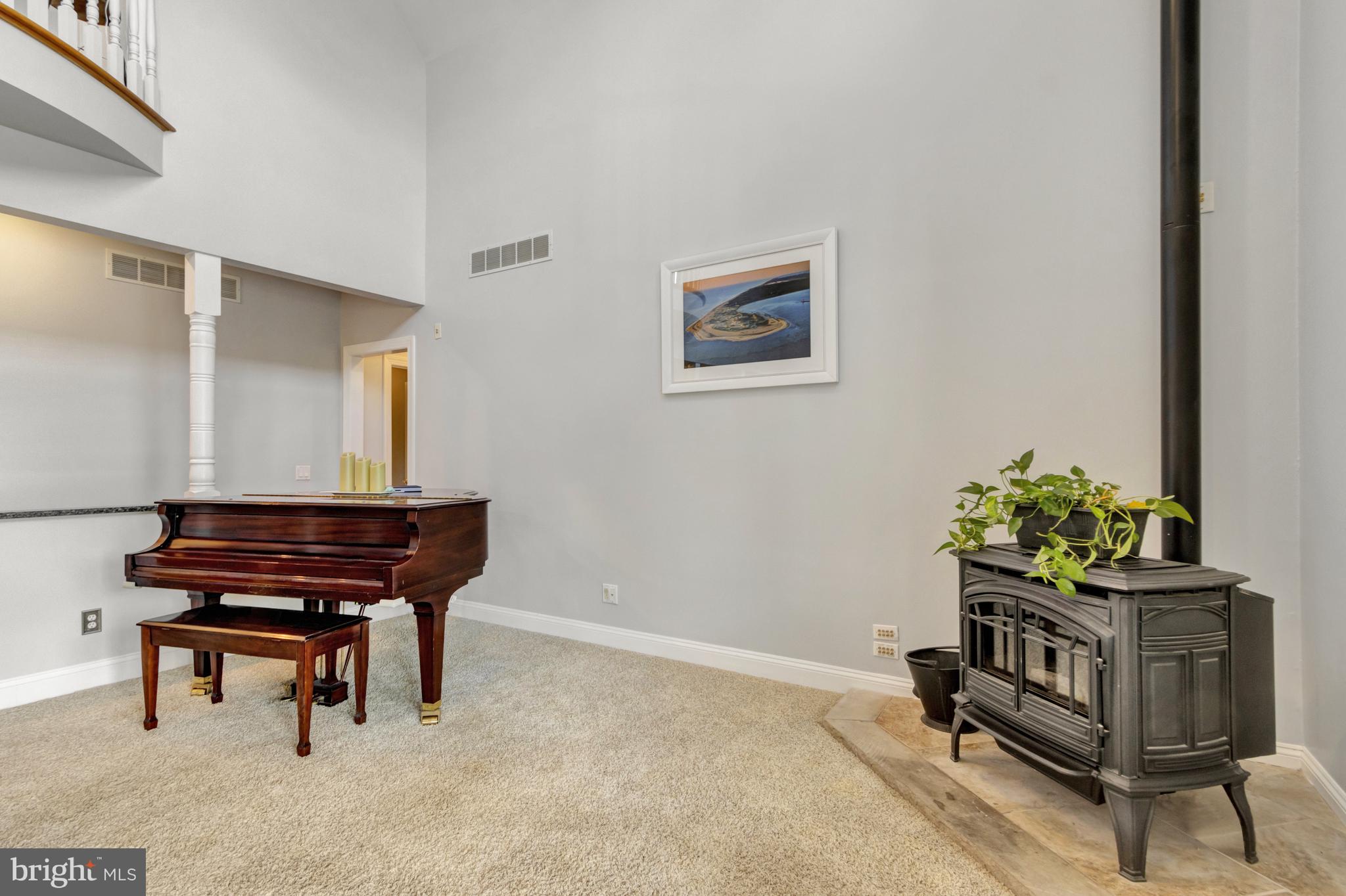 16132 Hudson Road Milton, DE 19968 - Photo 41 of 108 a room with chair table and a piano