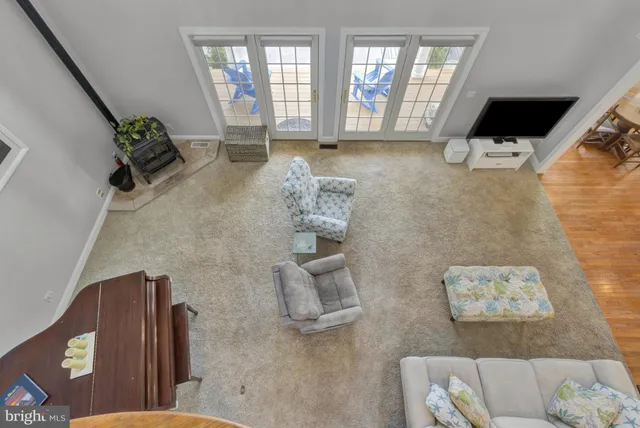 a view of yard with swimming pool and green space