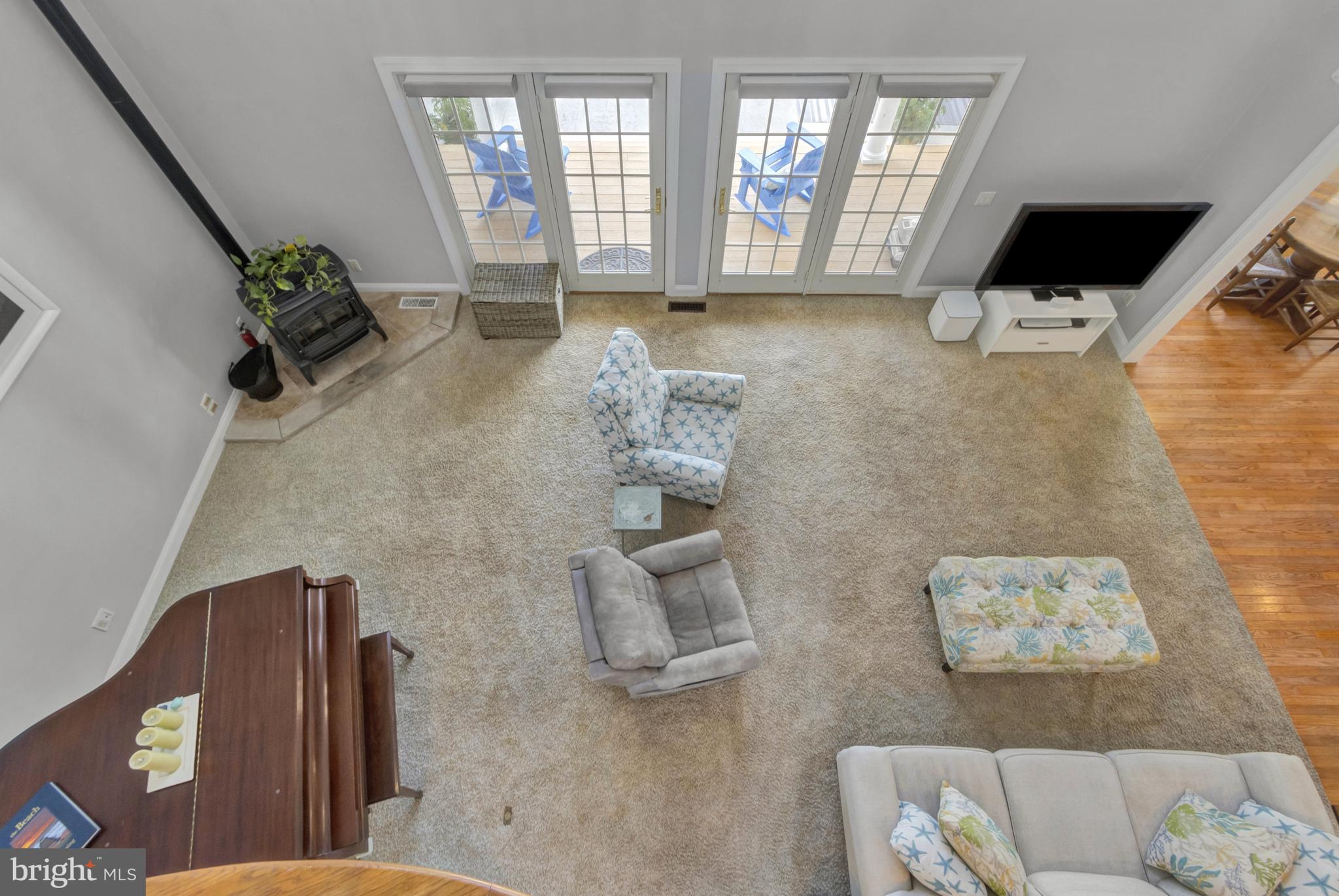 16132 Hudson Road Milton, DE 19968 - Photo 44 of 108 a living room with furniture and a flat screen tv