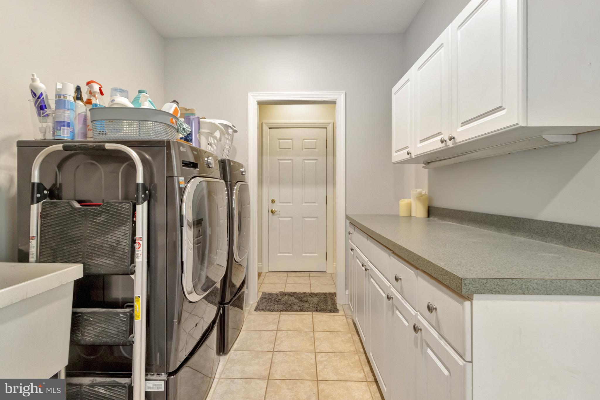 16132 Hudson Road Milton, DE 19968 - Photo 69 of 108 Laundry/mudroom leads to garage & bonus room.