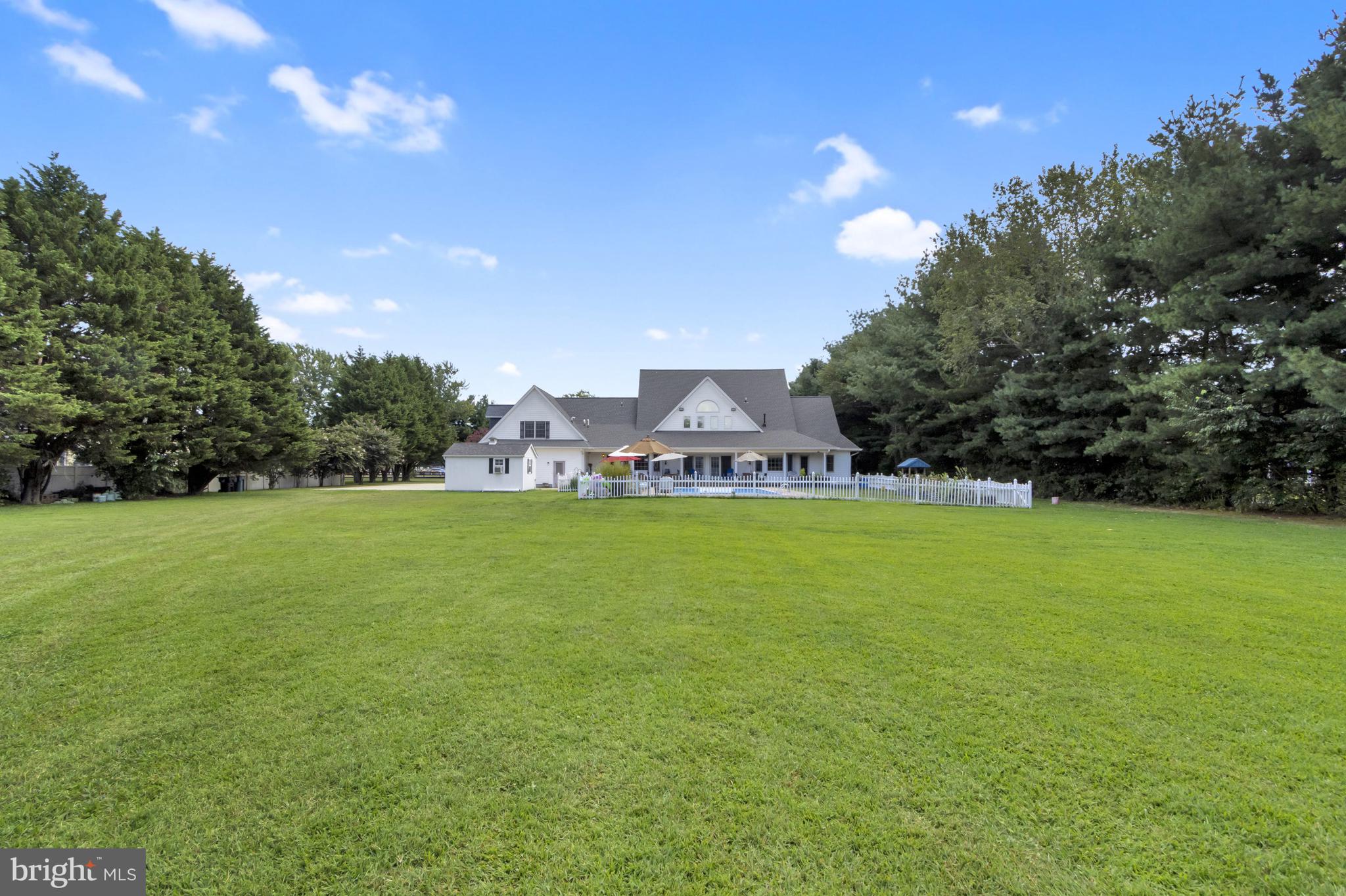 16132 Hudson Road Milton, DE 19968 - Photo 88 of 108 a view of yard with swimming pool and green space