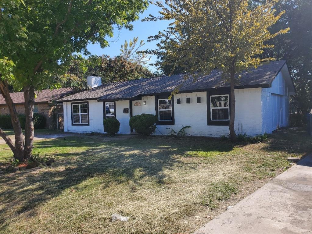 206 Springbranch Drive Garland, TX 75043 - Photo 2 of 12 a view of a house with a yard