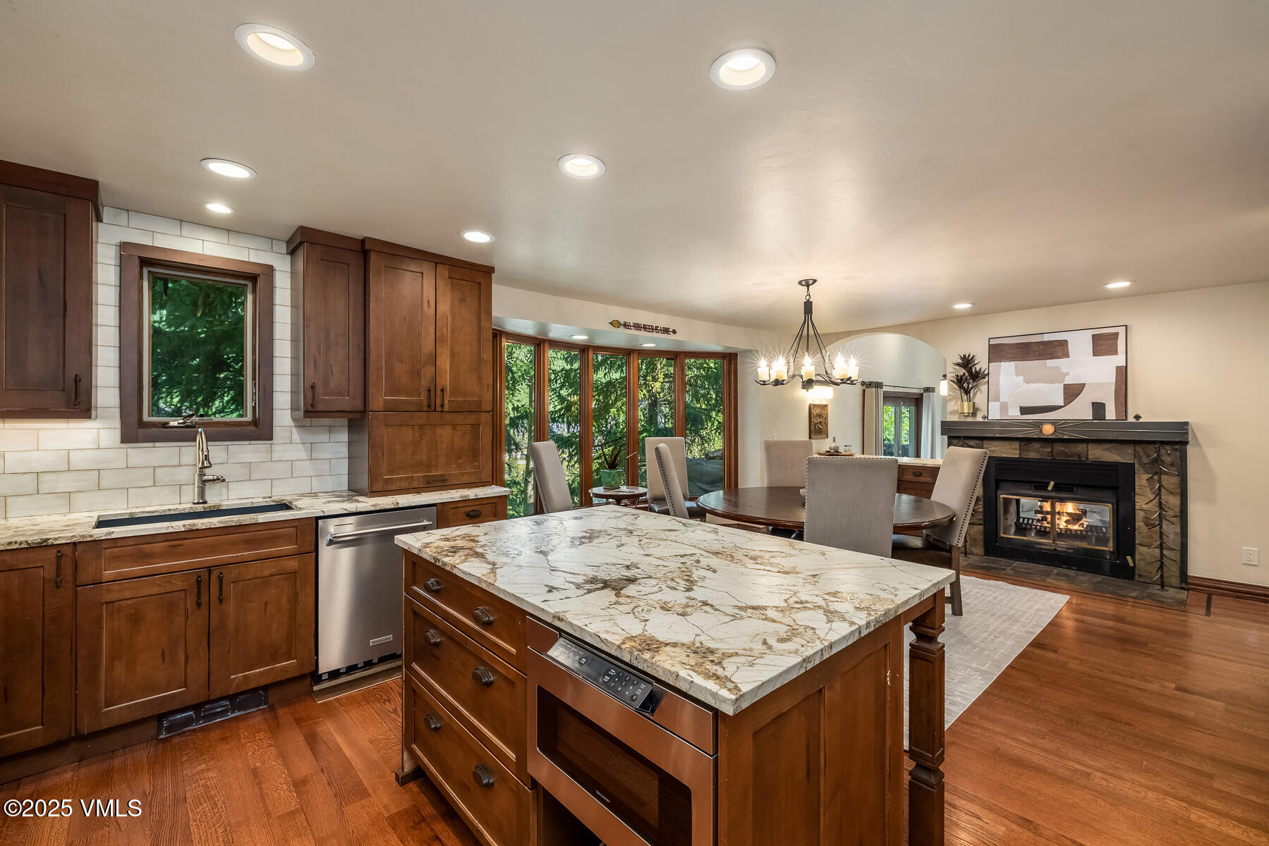 2010 Vermont Road Vail, CO 81657 - Photo 24 of 35 a kitchen with a stove and a wooden floors