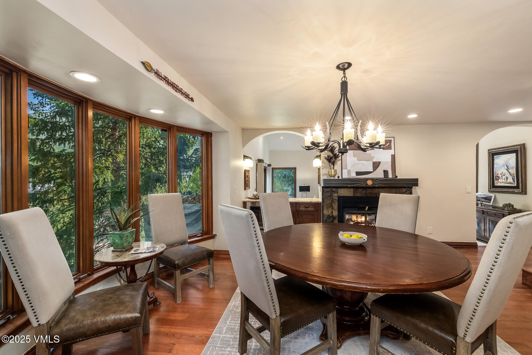 2010 Vermont Road Vail, CO 81657 - Photo 25 of 35 a view of a dining room with furniture window and wooden floor