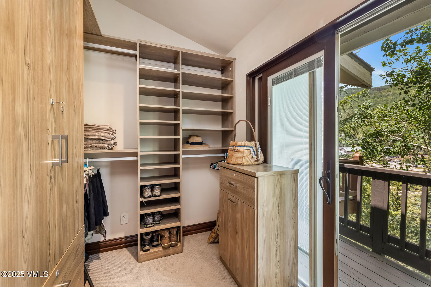2010 Vermont Road Vail, CO 81657 - Photo 28 of 35 a view of walk in closet with clothes and shoes