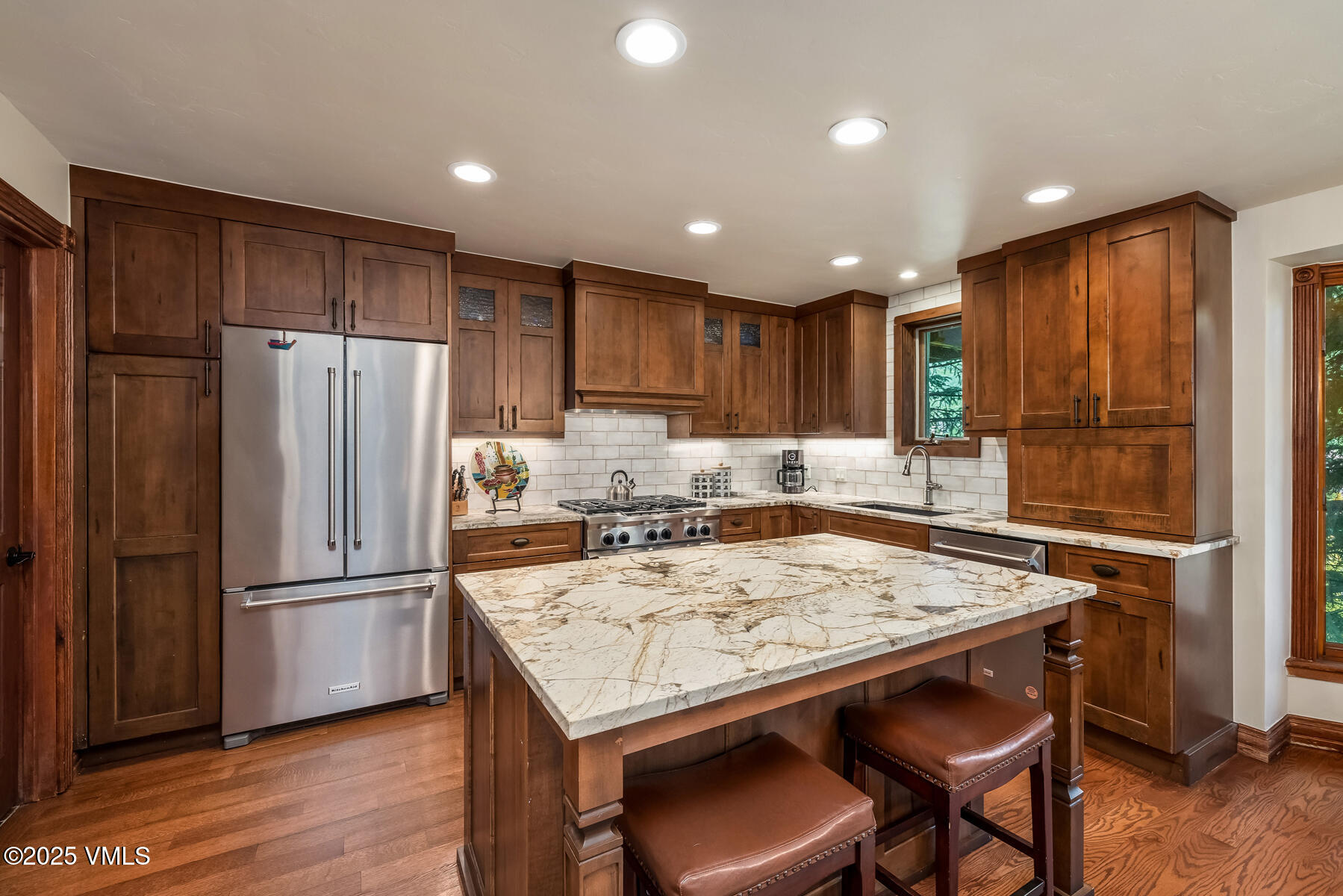 2010 Vermont Road Vail, CO 81657 - Photo 3 of 35 a kitchen with a refrigerator a stove a sink and a refrigerator