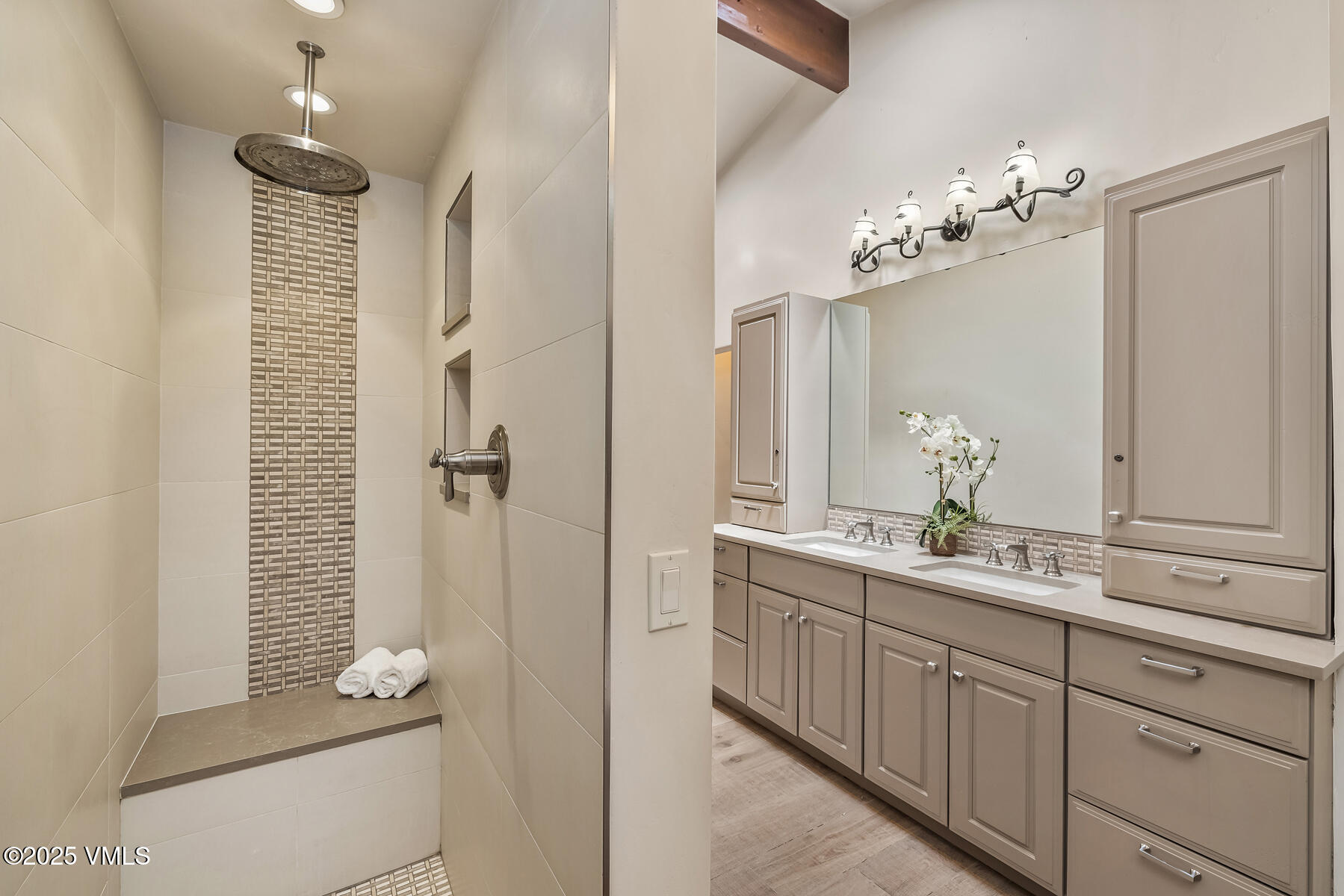 2010 Vermont Road Vail, CO 81657 - Photo 7 of 35 a bathroom with a double vanity sink and mirror
