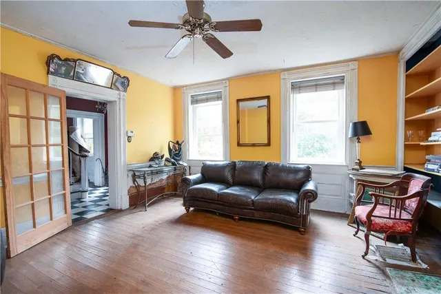 a living room with furniture and a window