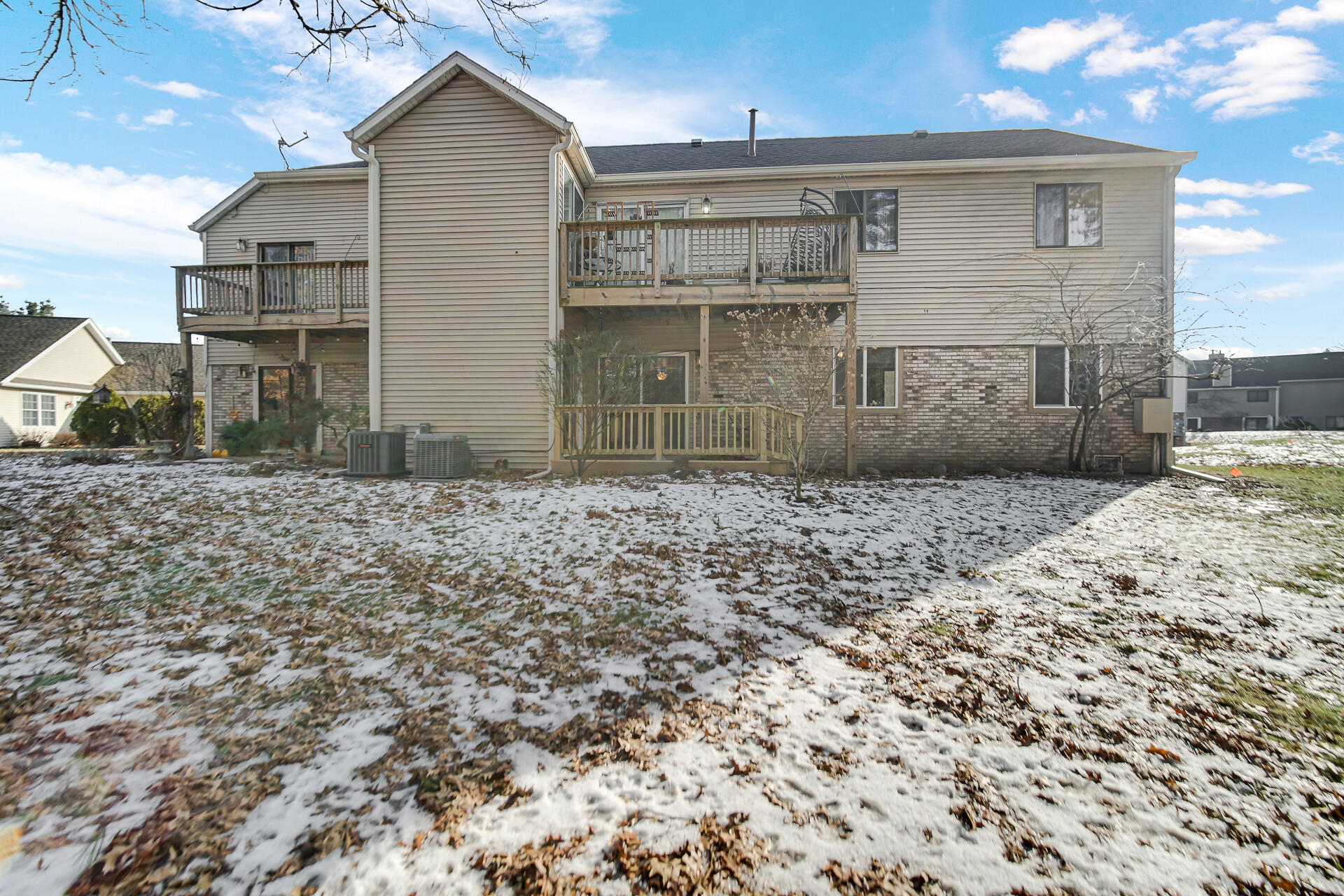 2114 Tupelo Lane Chesterton, IN 46304 - Photo 3 of 23 a front view of a house with a yard