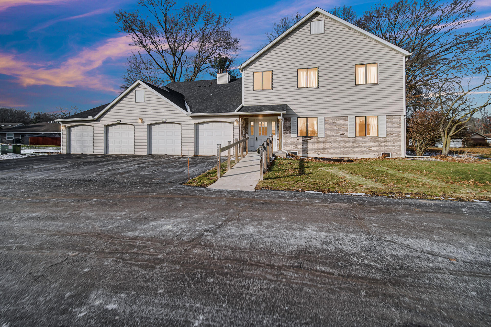 2114 Tupelo Lane Chesterton, IN 46304 - Photo 4 of 23 a front view of a house with a yard