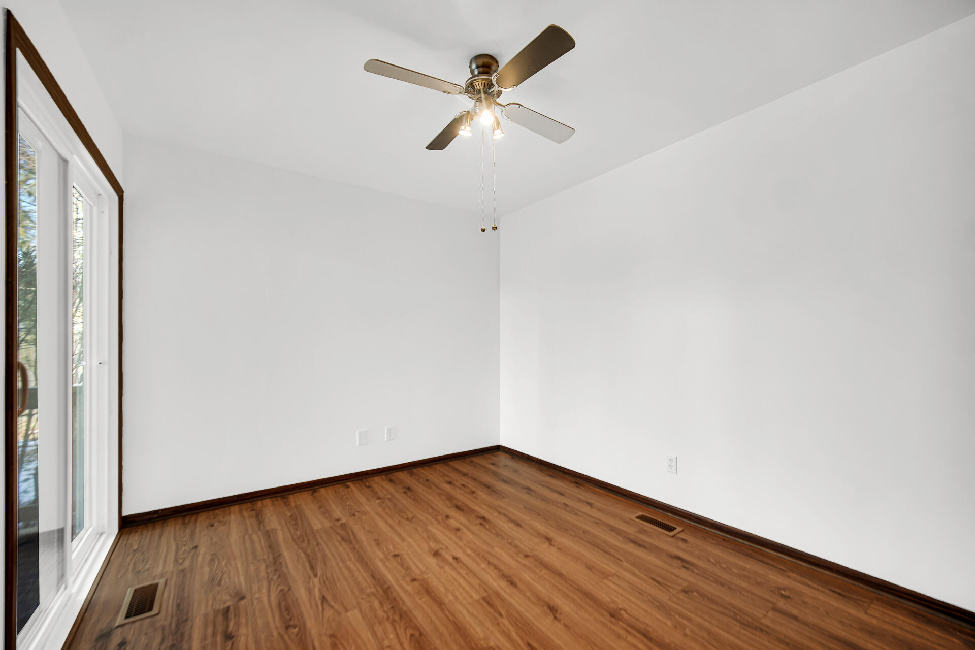 2114 Tupelo Lane Chesterton, IN 46304 - Photo 10 of 23 a view of empty room with wooden floor