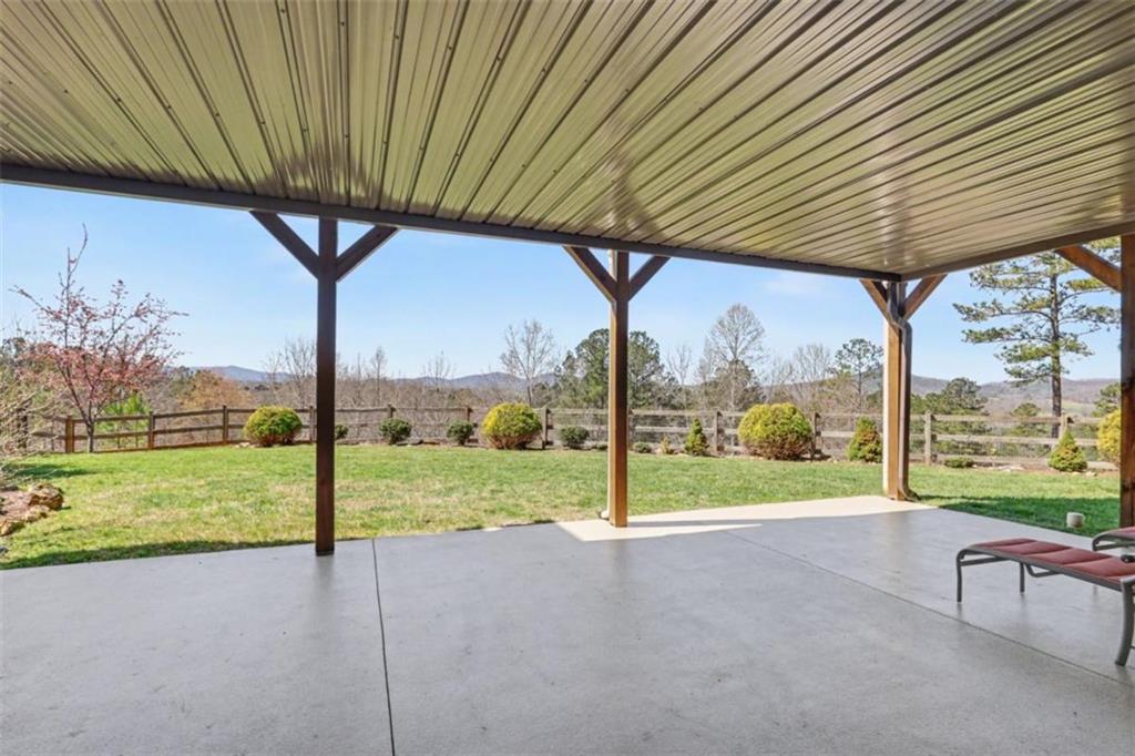 899 Ridge Pointe Way Blairsville, GA 30512 - Photo 43 of 88 a view of a big room next to a yard